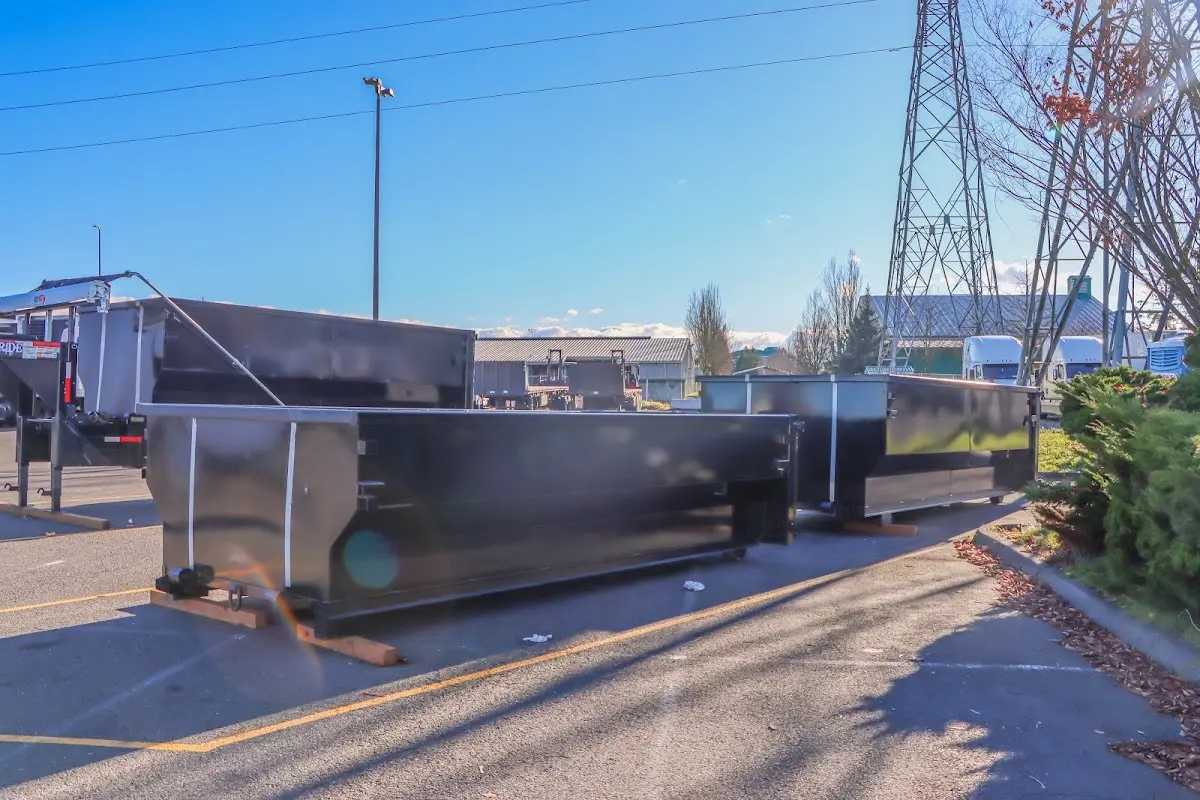 Roll-off dumpster ready for waste disposal at job site for 2 Yard Dumpster Rental in Wyoming